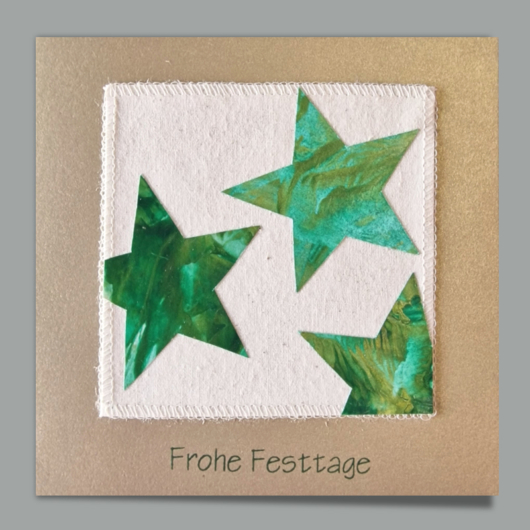 Bild der Weihnachtskarte Ruth mit Encausticsternen in grün-gold
